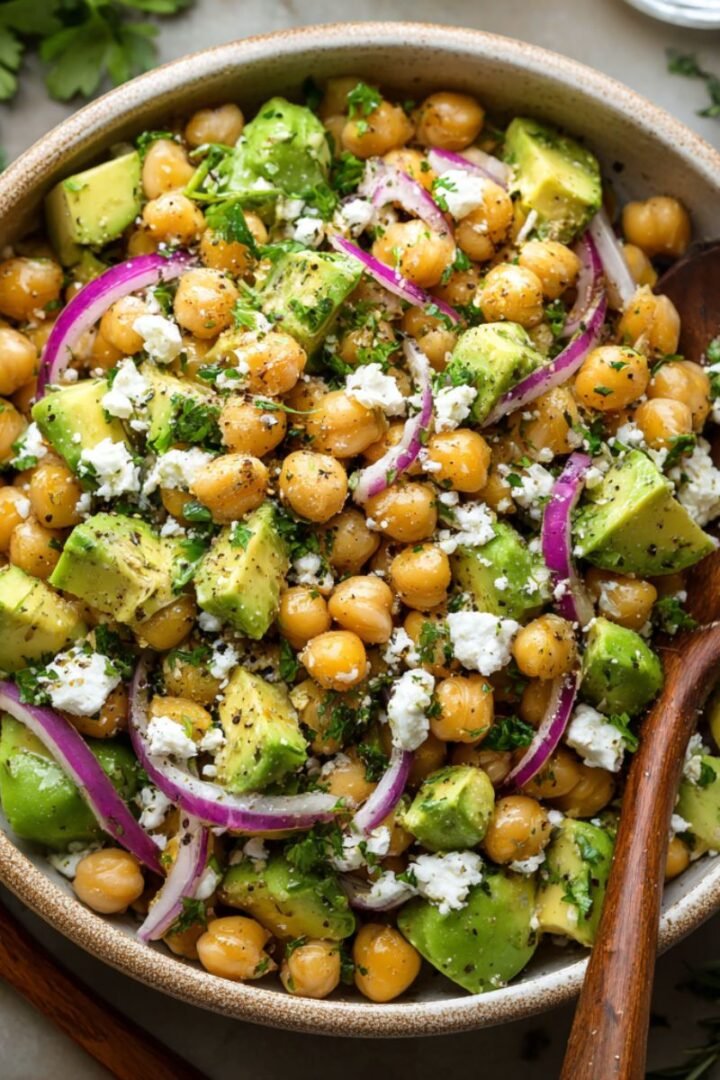 Fresh 15 minute chickpea avocado salad with chickpeas avocado feta red onion and herbs