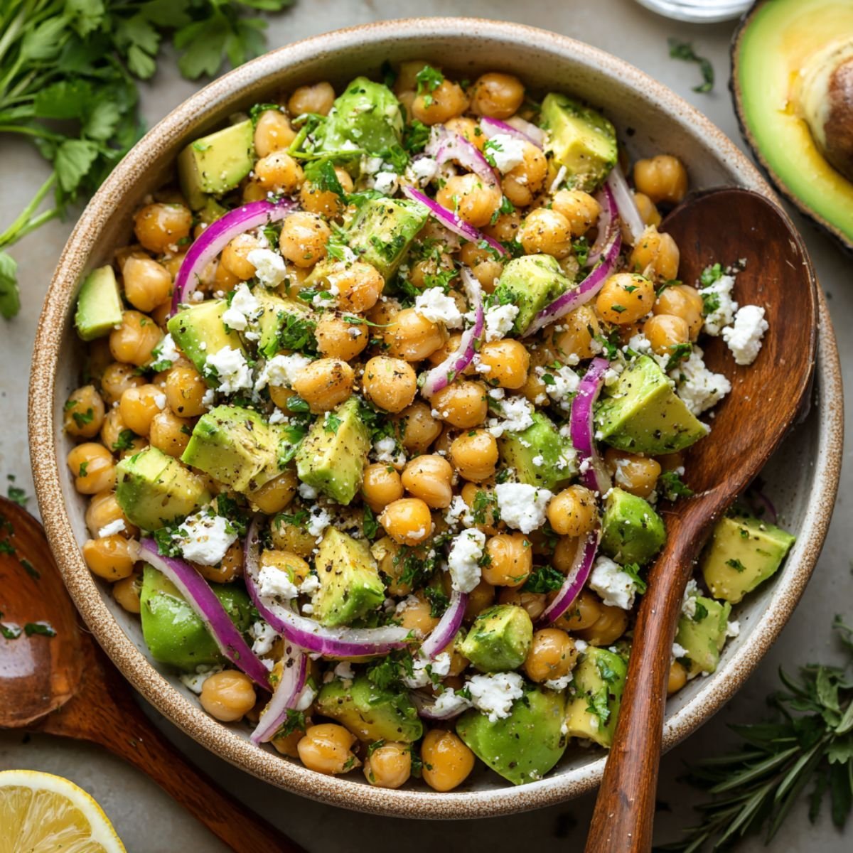 Fresh 15 minute chickpea avocado salad with chickpeas avocado feta red onion and herbs